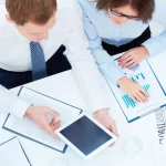Illustration showing busy professionals organizing tasks with various productivity apps